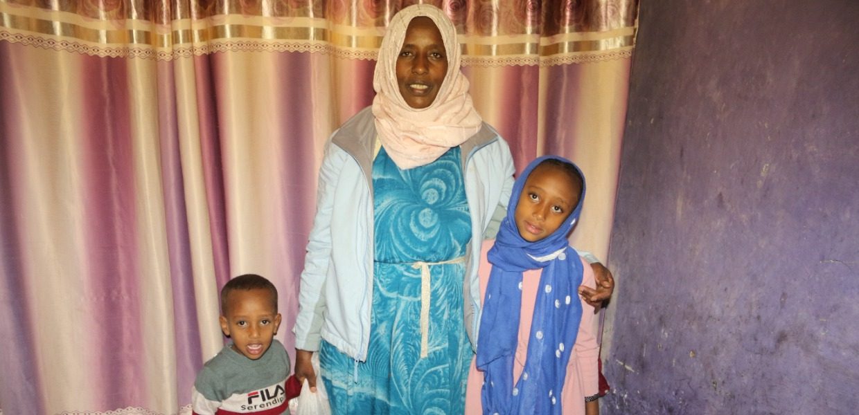 ajaiba and her two young children, a daughter and son