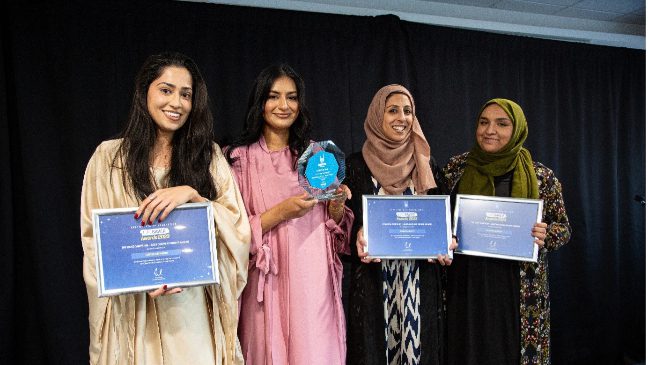 a group of winners receiving their awards at islamic relief's lifesavers award ceremony