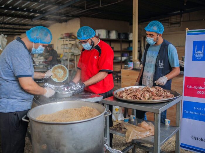 islamic relief cooking large pots of hot food to be distributed to families in gaza