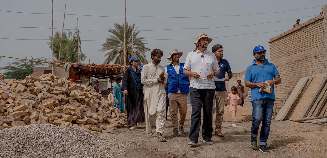 mp afzal khan with islamic relief visiting rebuilding homes projects in pakistan