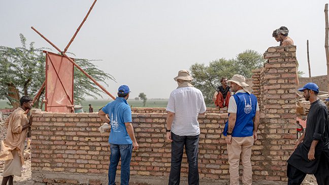 mp afzal khan with islamic relief visiting rebuilding homes projects in pakistan