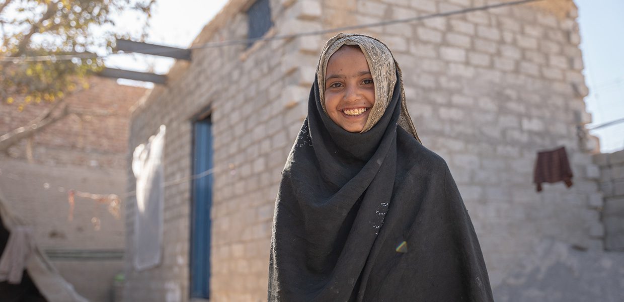 Young girl looking at the camera and smiling