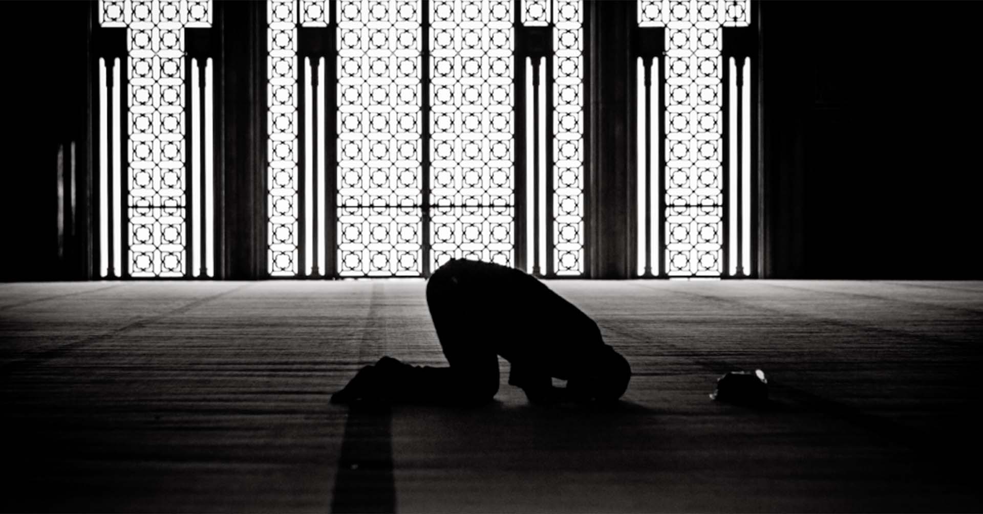 man in sujood position for prayer salah prayer timetables dewsbury