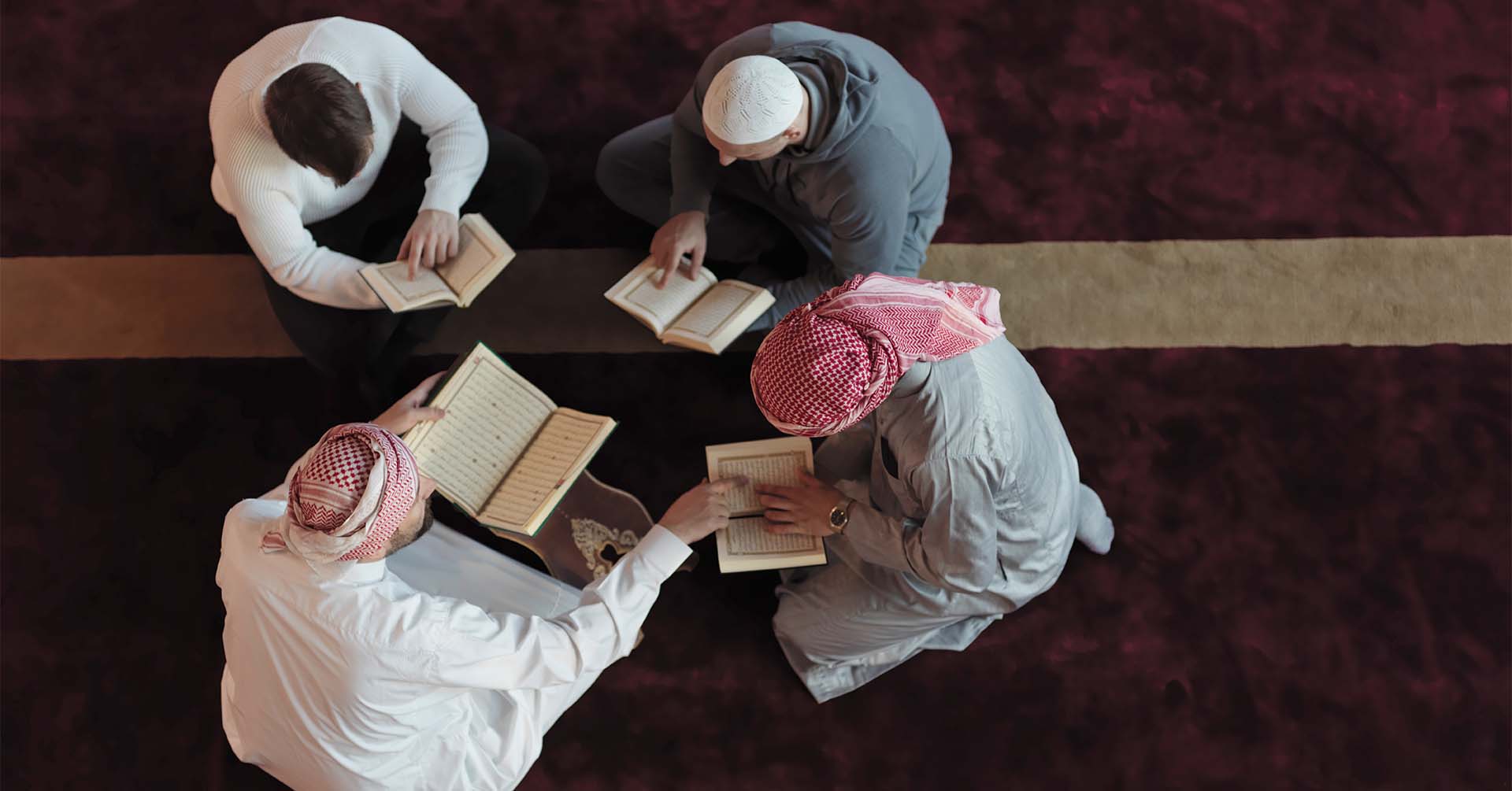 men gathered in a masjid reading quran together prayer timetables nottingham