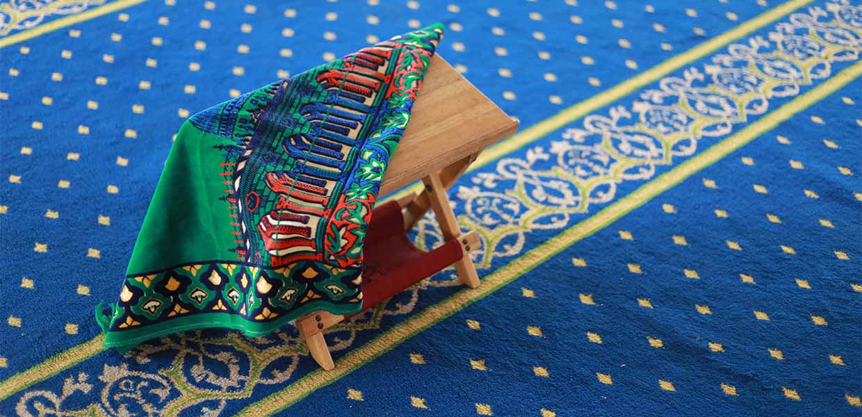 prayer mats on masjid carpet prayer timetables