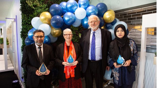 a group of winners receiving their awards at islamic relief's lifesavers award ceremony