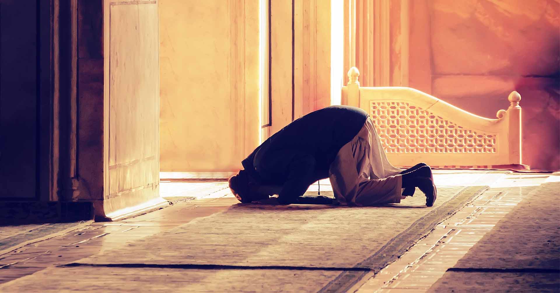 man praying salah in sujood position