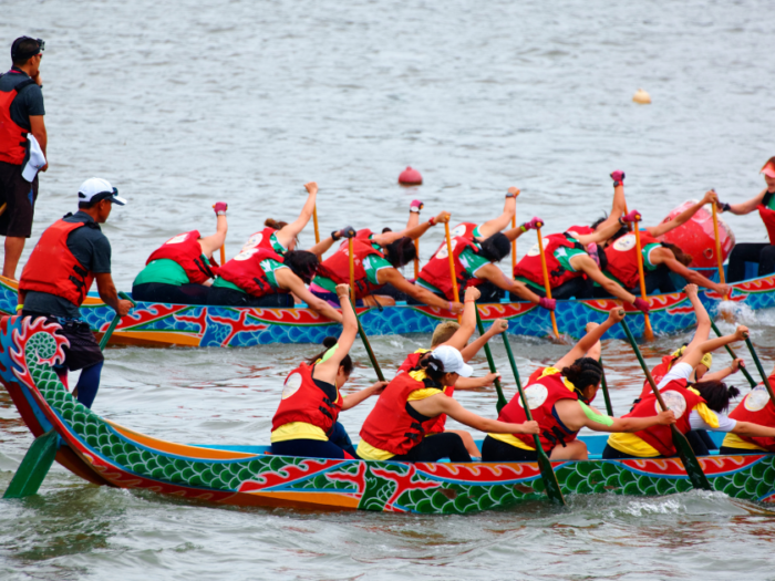 Group of people on dragon boats