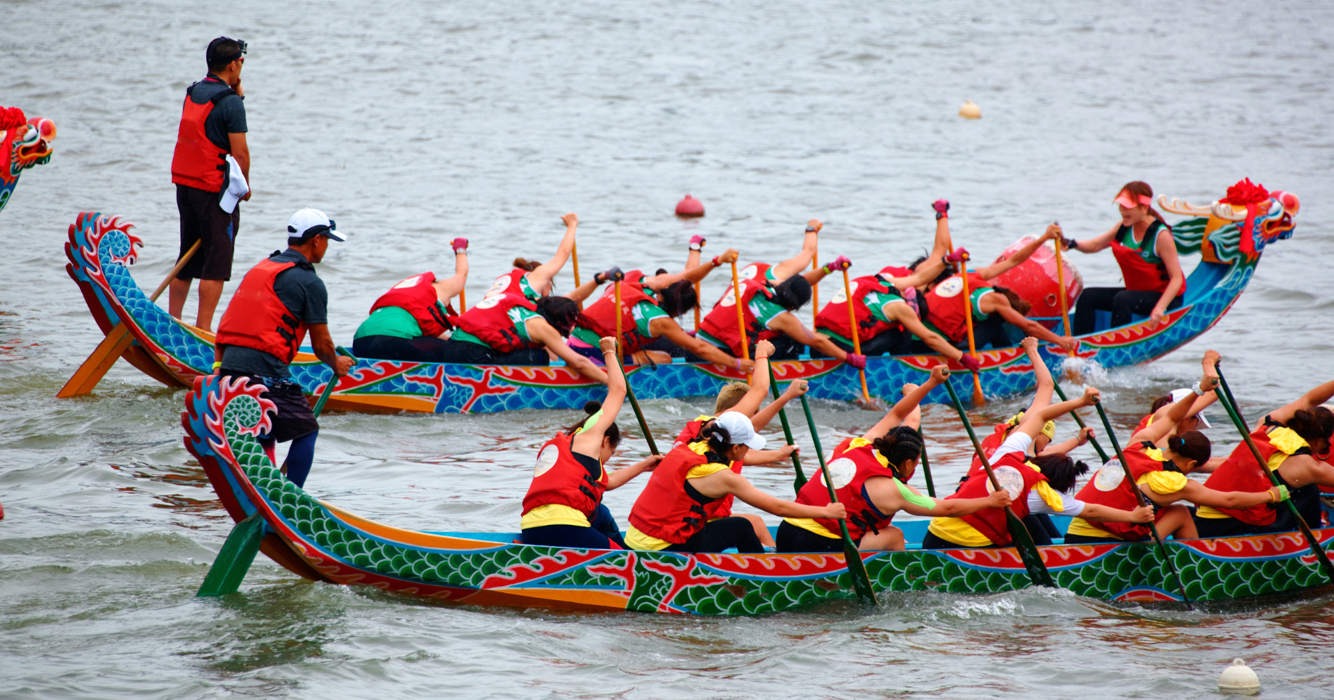 Group of people on dragon boats