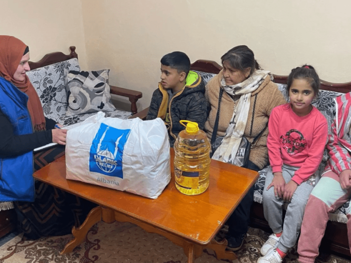 albanian family visited by islamic relief to support them with aid for winter
