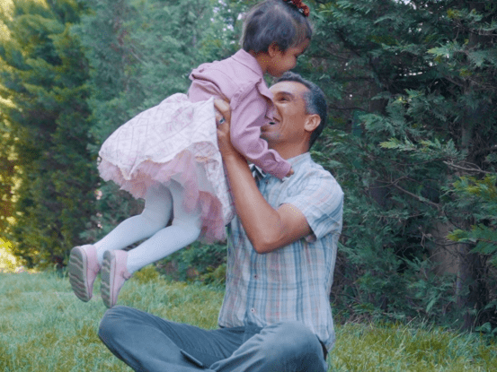 a father in jordan playing with his daughter